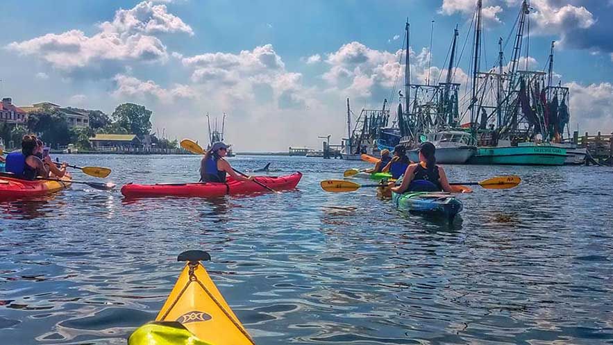 kayak-team-building-01-95044595 Nature's Classroom: Discovering the Lessons of Teamwork through Kayaking in Shem Creek, Charleston